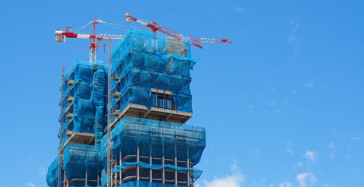 What are the essential uses of tarps in industrial and construction settings ?